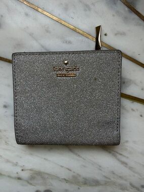kate spade silver glitter zip-around wallet